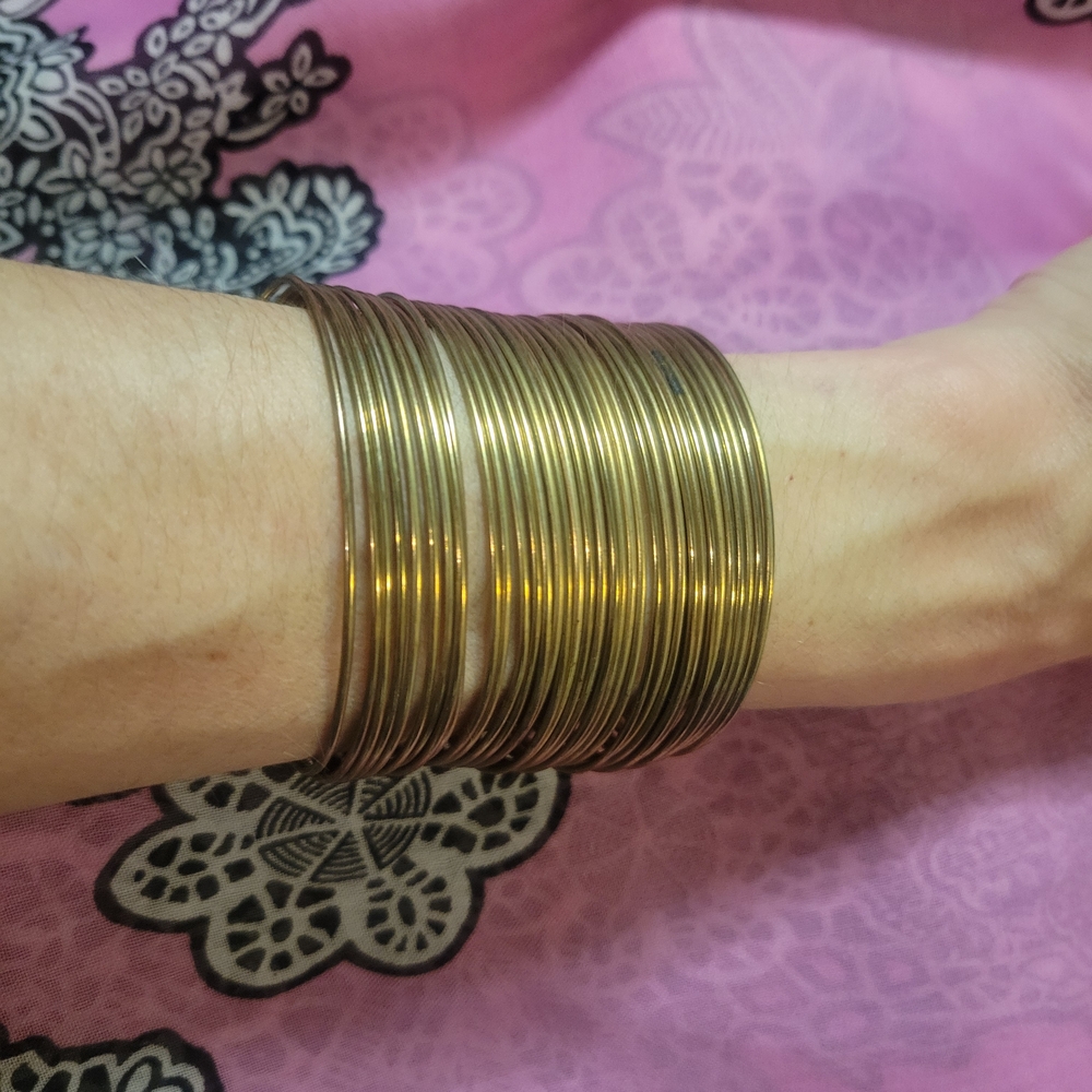 Elegant Gold Tone Bangle Set